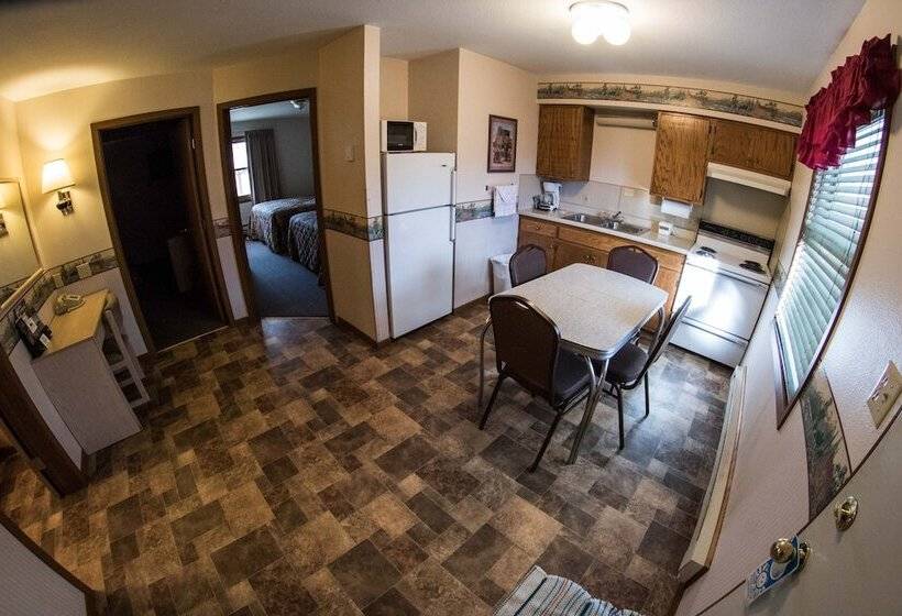 Отель Stagecoach Inn & Suites