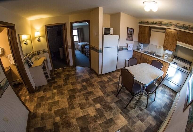 Отель Stagecoach Inn & Suites