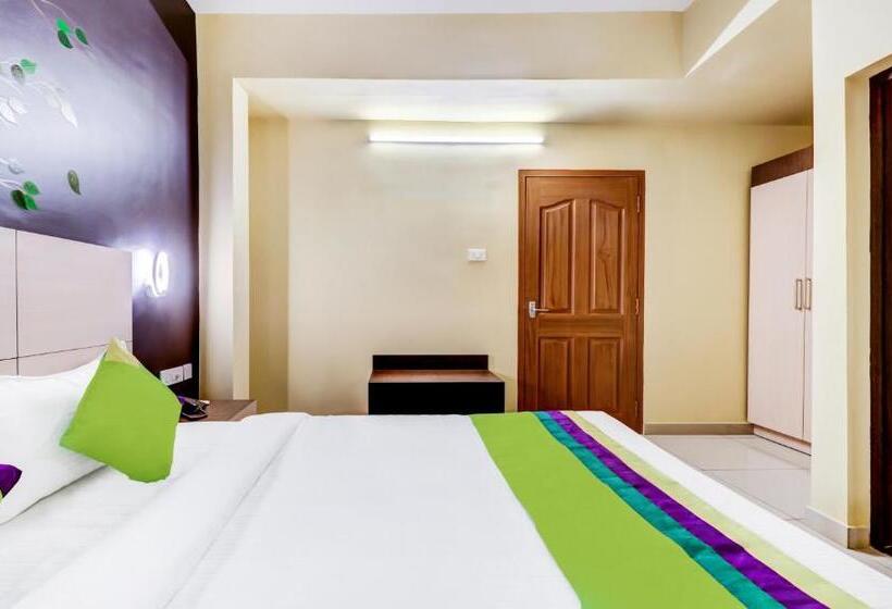 Отель Treebo Petals Suites