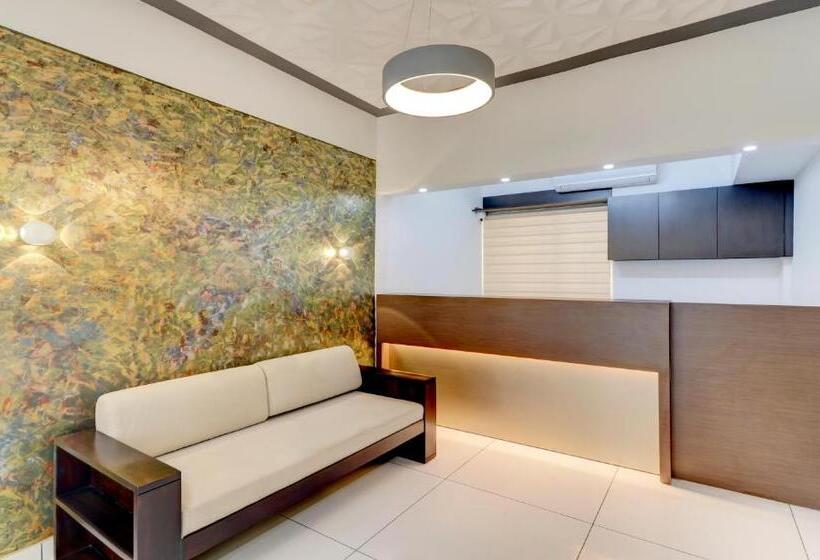 Отель Treebo Petals Suites