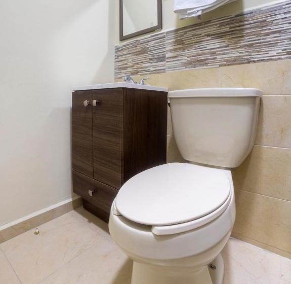 فندق Capital O Descanso Inn