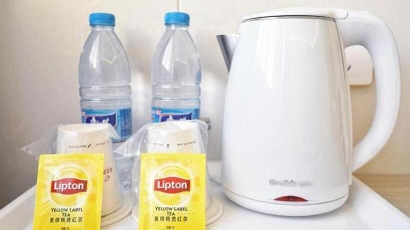 Отель Shell Shanghai Baoshan District  Songbin Road Subway Station