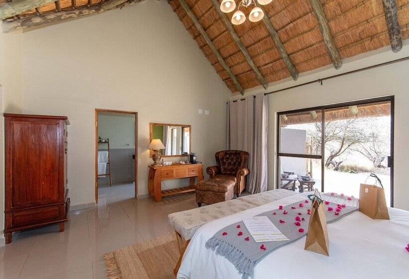 Отель Tomo Safari Lodge