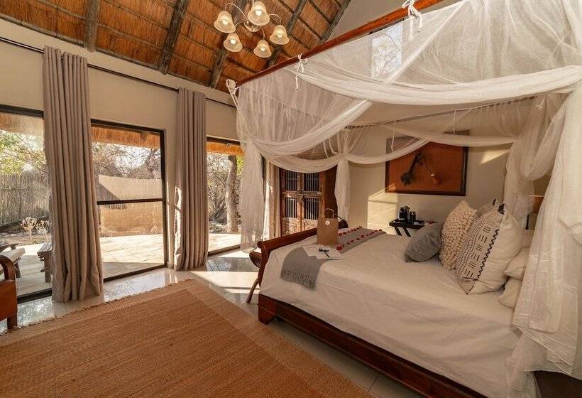 Отель Tomo Safari Lodge