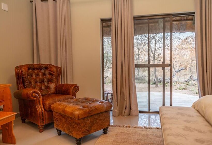 Отель Tomo Safari Lodge