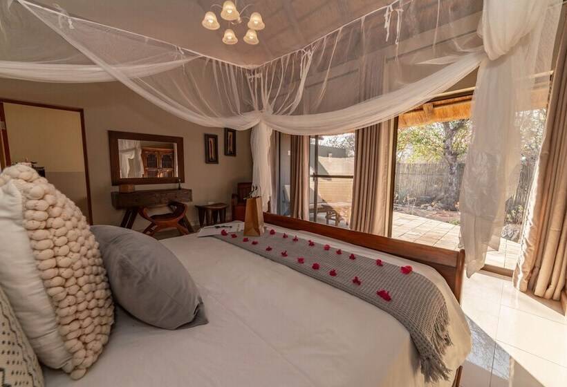 Отель Tomo Safari Lodge