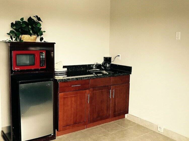 호텔 Sutton Suites