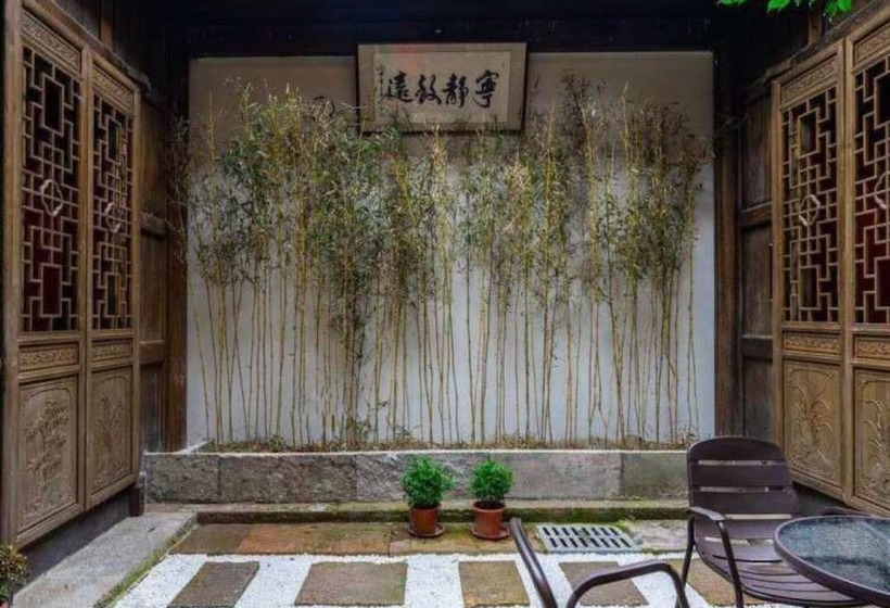 Отель Floral Sheng Poman Courtyard