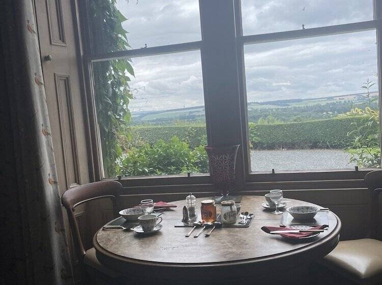 مبيت وإفطار Clint Lodge