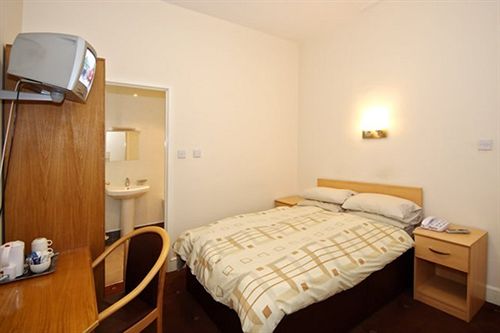 ホテル Mclays Guest House