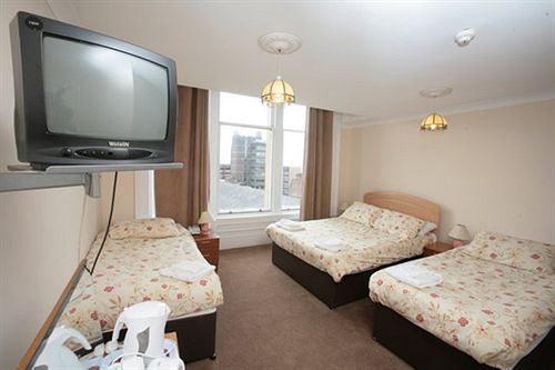 ホテル Mclays Guest House