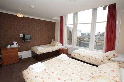 ホテル Mclays Guest House