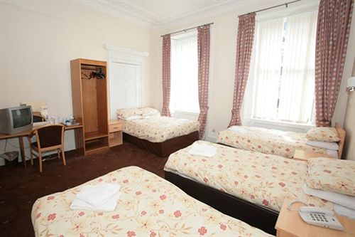 ホテル Mclays Guest House