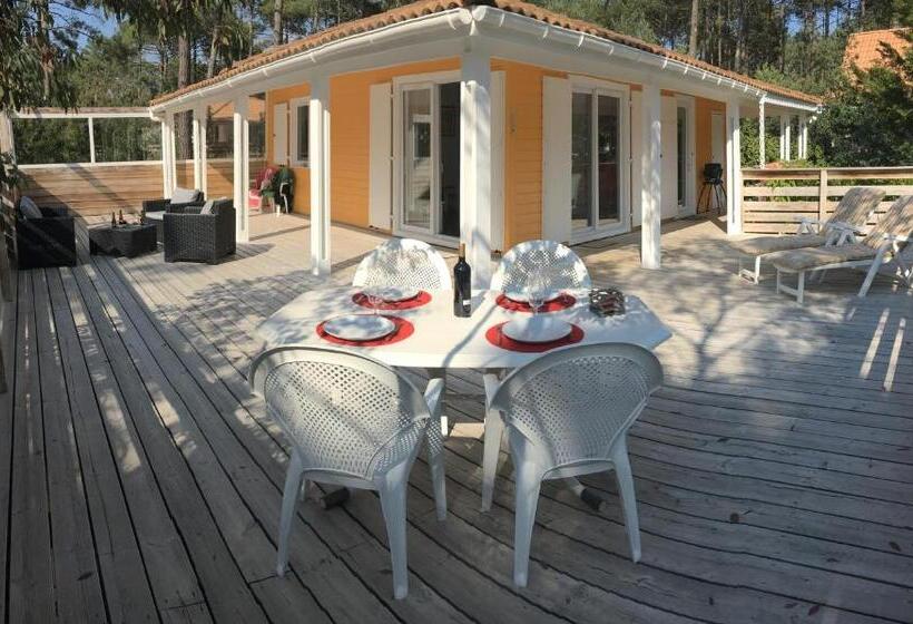 Chalet Orange Naturiste La Jenny