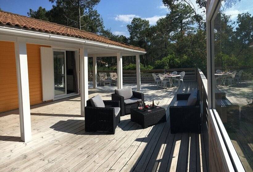 Chalet Orange Naturiste La Jenny