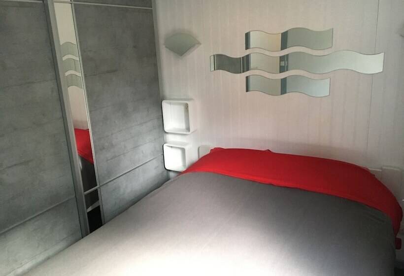 Chalet Orange Naturiste La Jenny