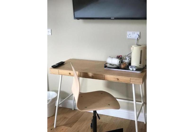 Отель The Linen House