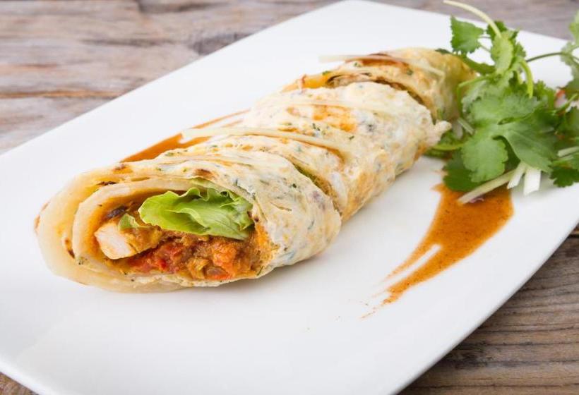 Отель Capital O  Sobo Central