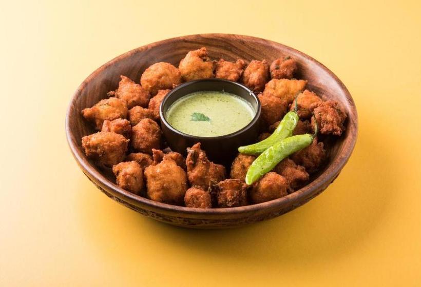 Отель Capital O  Sobo Central