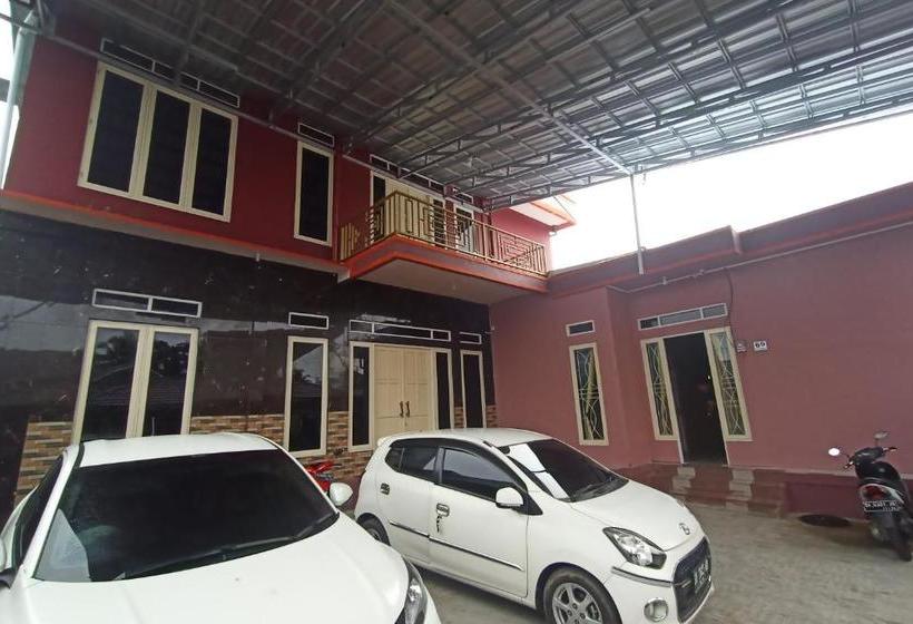 Отель Spot On 3525 Penginapan Magnolia Syariah