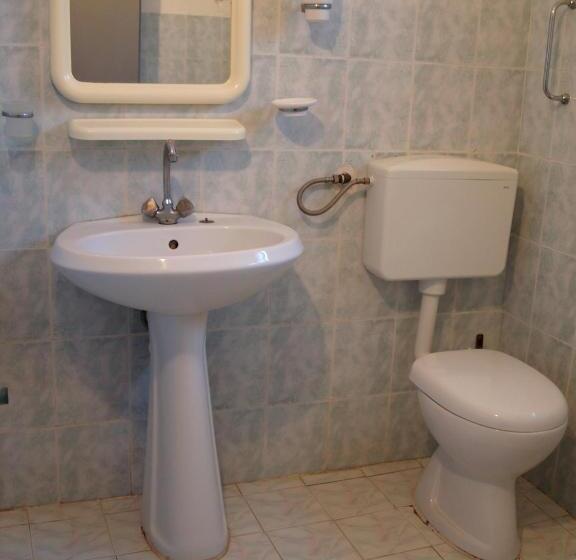 פנסיון Q Bay Apartments