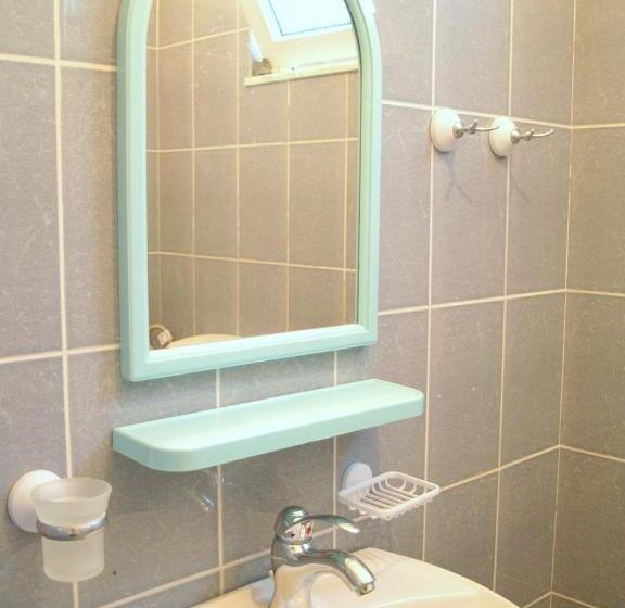 פנסיון Q Bay Apartments