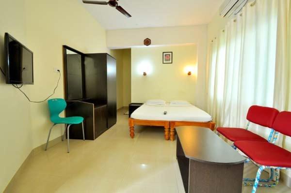 בית מלון כפרי Airport Residency Bangalore