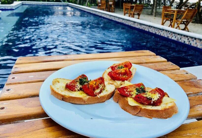 בית מלון כפרי Blue Mango Beach