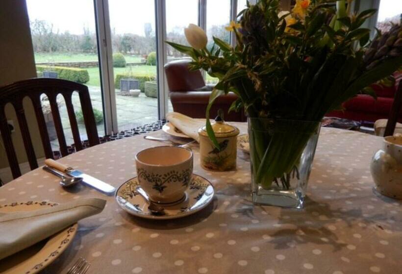 مبيت وإفطار Rose Cottage