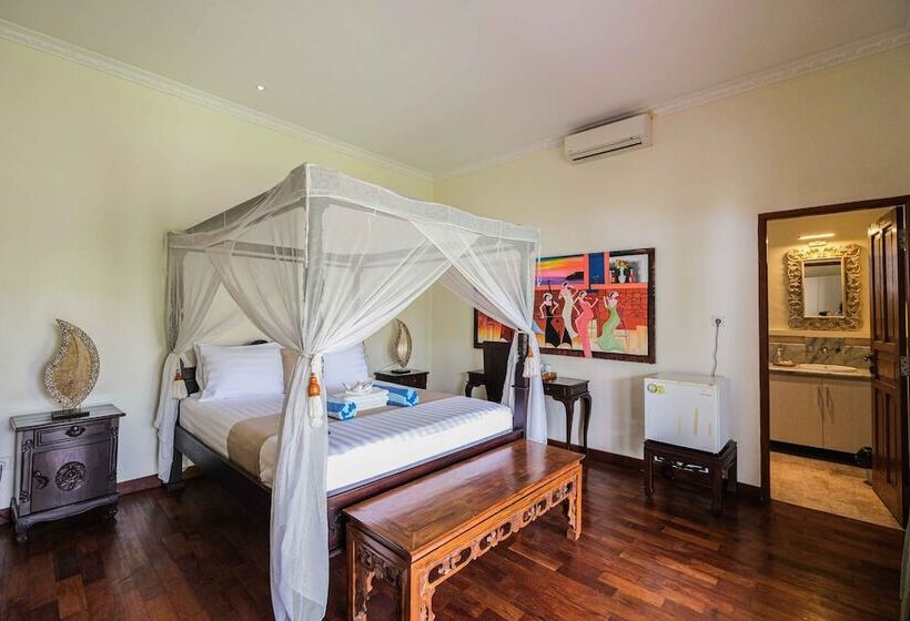 Отель Poinciana Resort Bali
