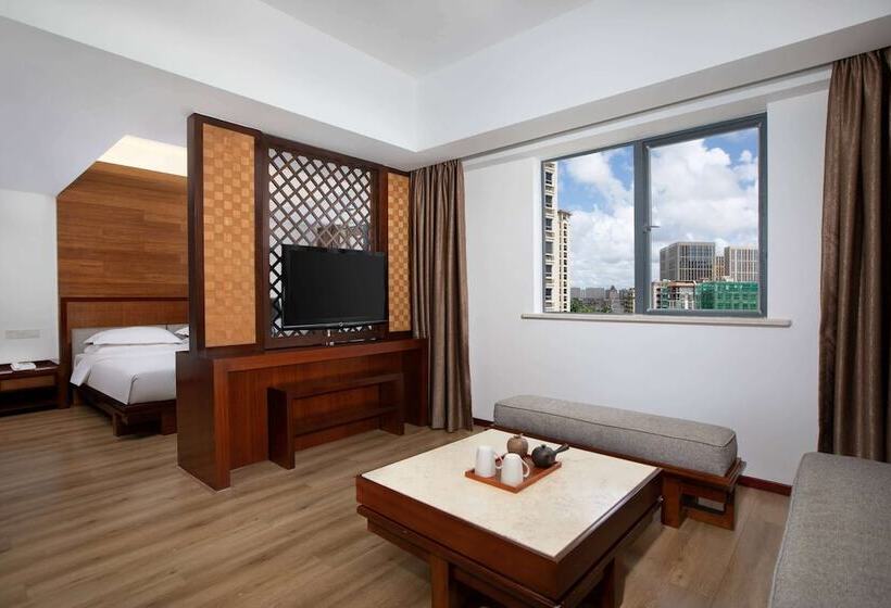 בית מלון כפרי Ramada Encore By Wyndham Qionghai Downtown