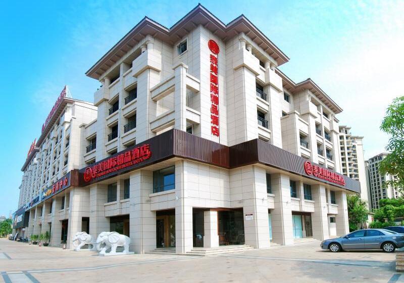 בית מלון כפרי Ramada Encore By Wyndham Qionghai Downtown