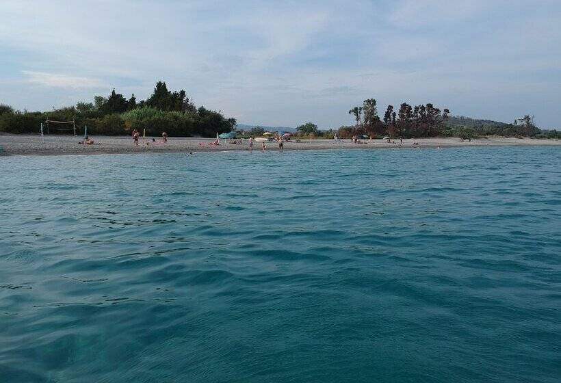 Отель Villaggio Camping Calypso