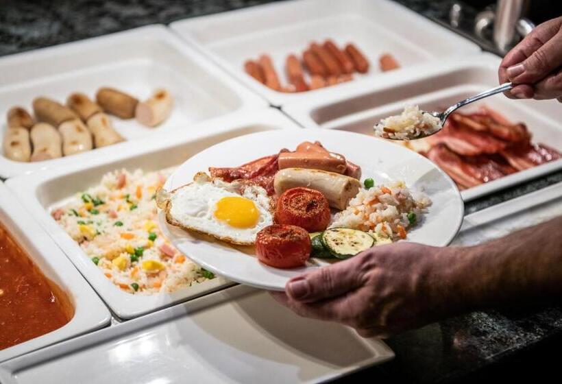 Отель Catalonia Eixample 1864