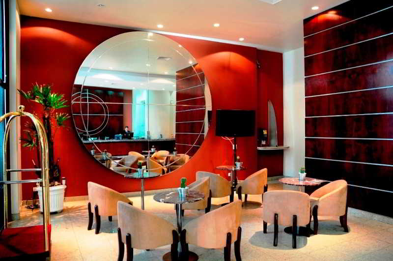 Отель Slaviero Suites Curitiba Soho