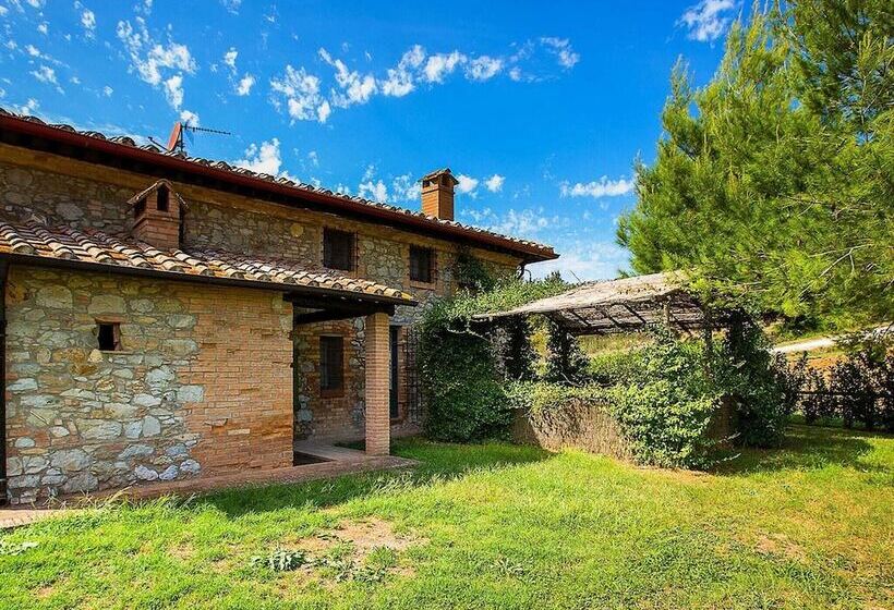A Rustic House Set In The Tuscan Landscape