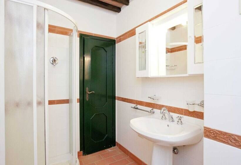 A Rustic House Set In The Tuscan Landscape