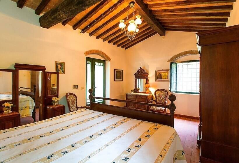 A Rustic House Set In The Tuscan Landscape