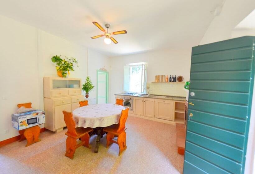 House Overlooking The Lake, In A Hilly Position