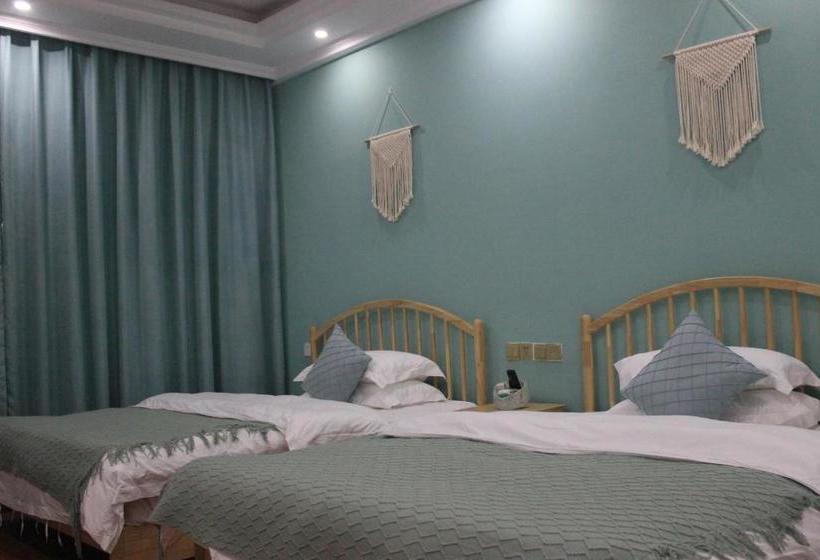 בית מלון כפרי Emeishan Jinmao