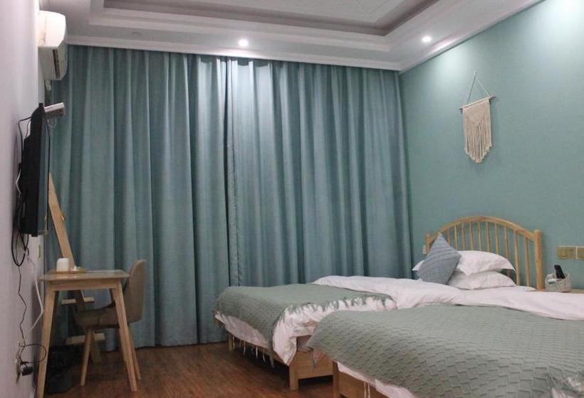 בית מלון כפרי Emeishan Jinmao