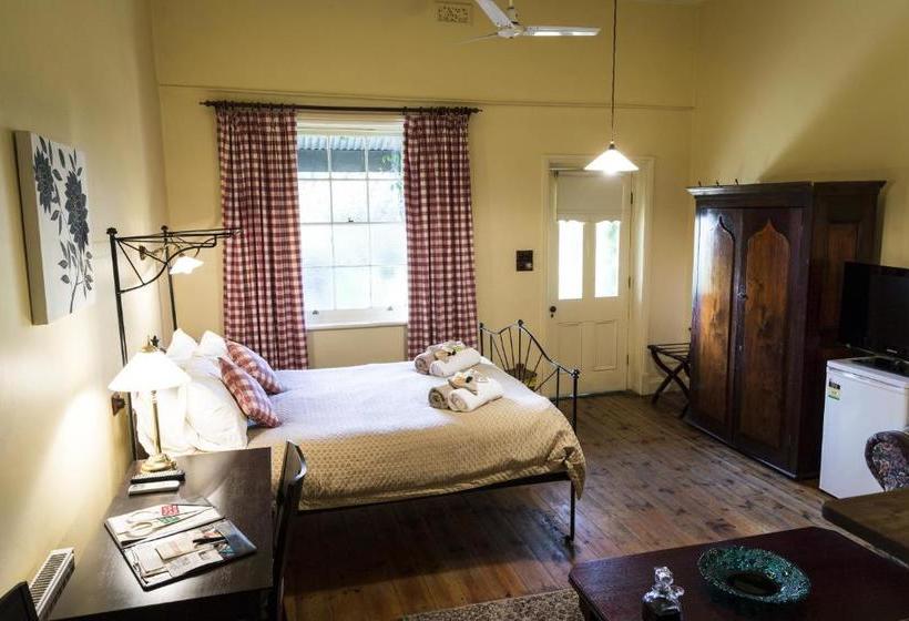 Отель The Rising Sun