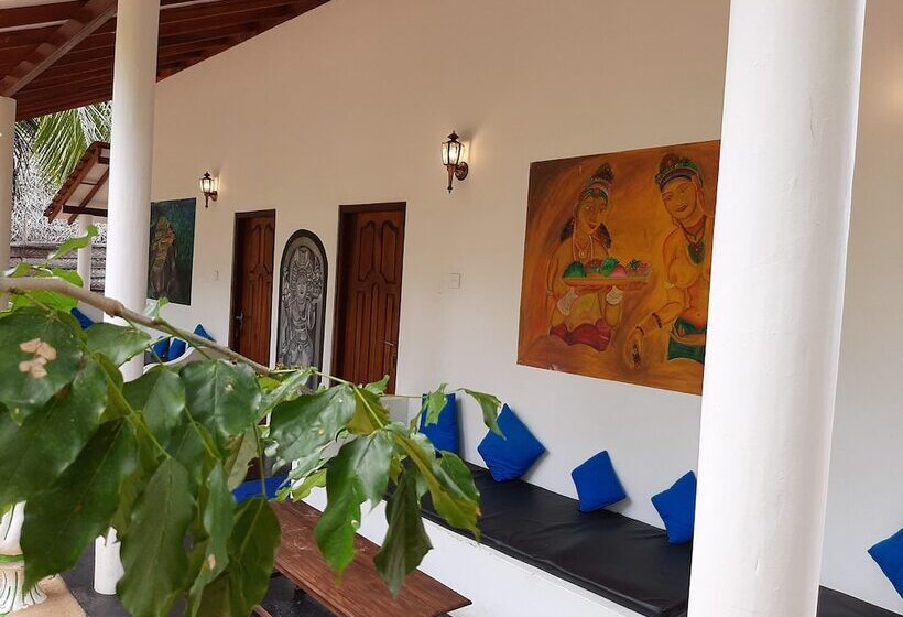 בית מלון כפרי Omeesha Beach