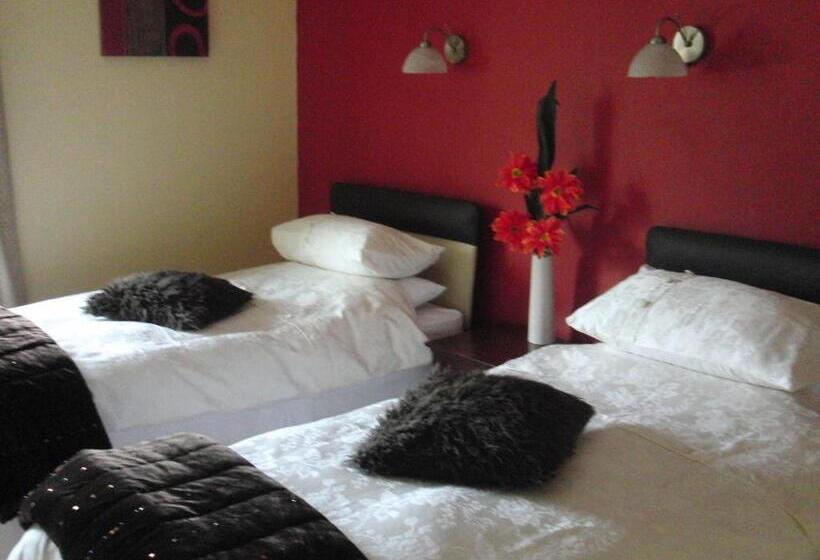 مبيت وإفطار Woodlands House