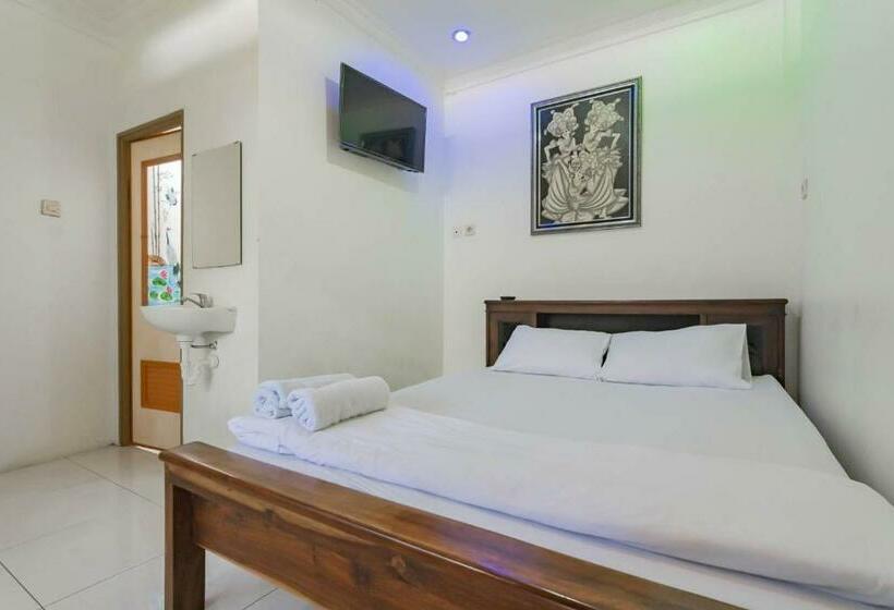 Отель Erika Homestay Mitra Reddoorz