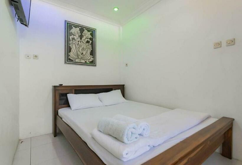 Отель Erika Homestay Mitra Reddoorz