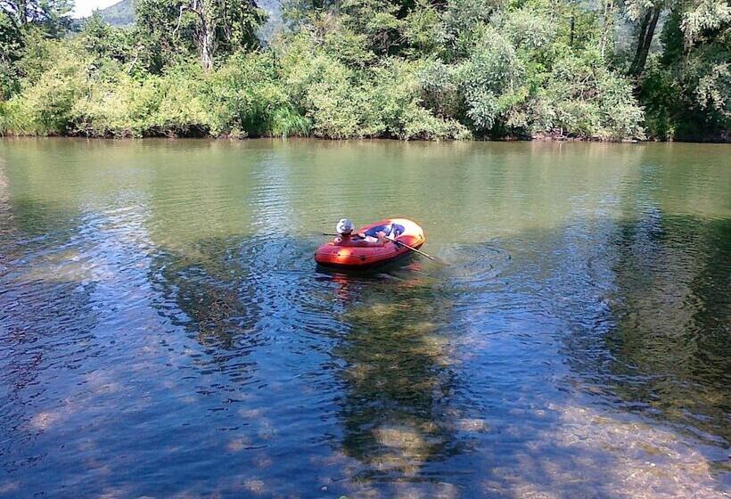 Traditional Wooden House By The River
