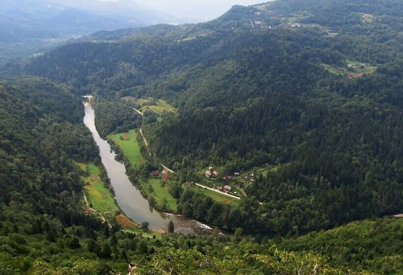 Traditional Wooden House By The River