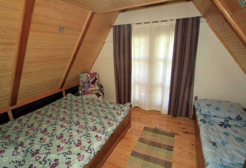 Traditional Wooden House By The River