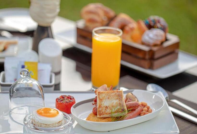 호텔 Earls Regency